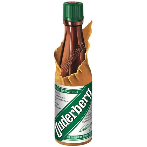Underberg single-serve digestif bottle in its signature straw-paper wrapper