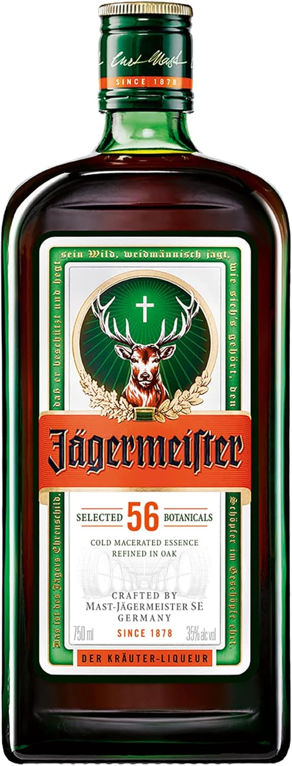 Green glass bottle of Jägermeister German herbal liqueur with its orange stag label