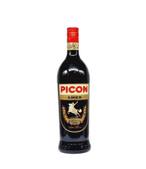 Bottle of Amer Picon French bitter orange aperitif with a red capsule and gold-framed black label