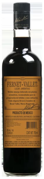 Bottle of Fernet Vallet Mexican fernet with dark liquid and an ornate cream label